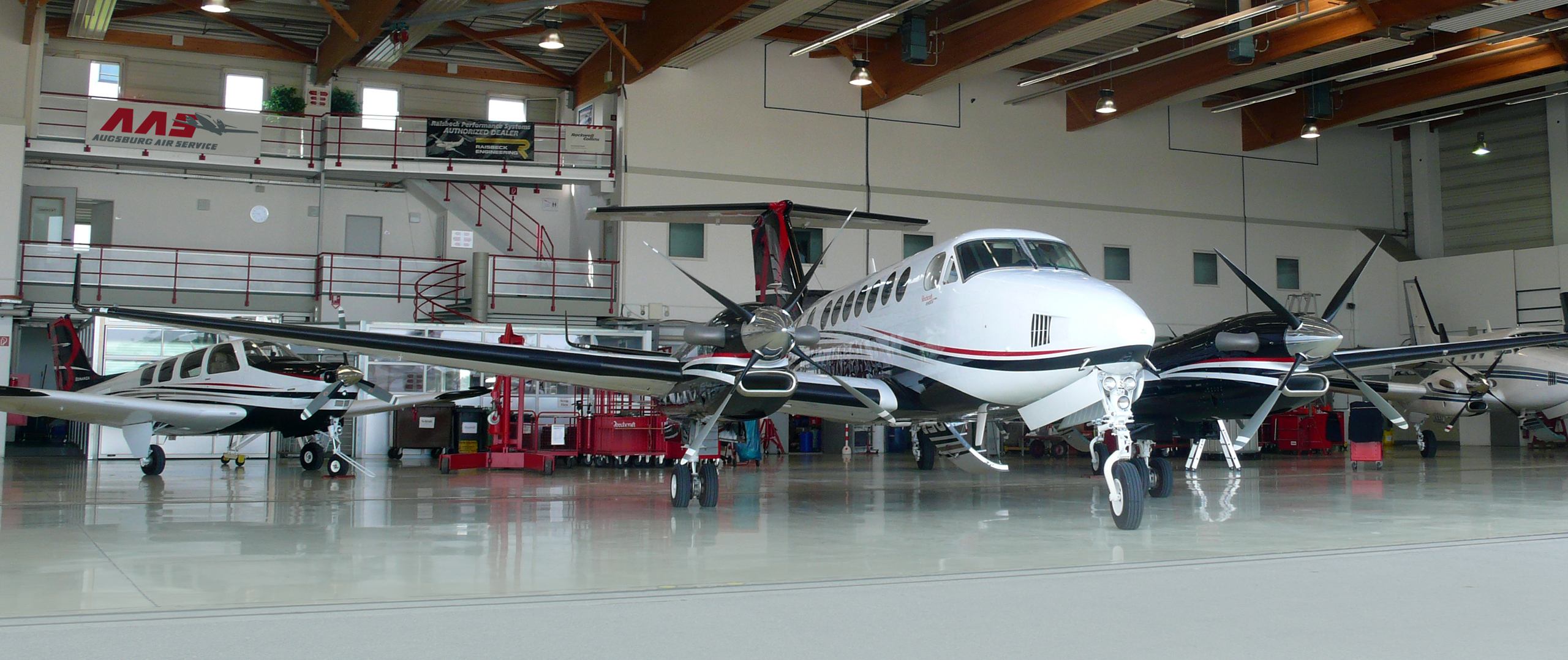 Turboprop aircraft inside an airplane hangar